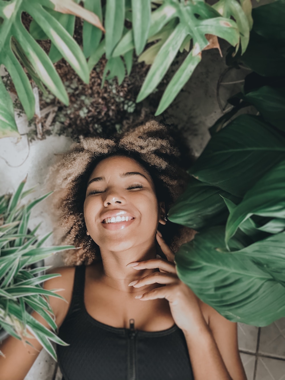 girl smiling on floor
